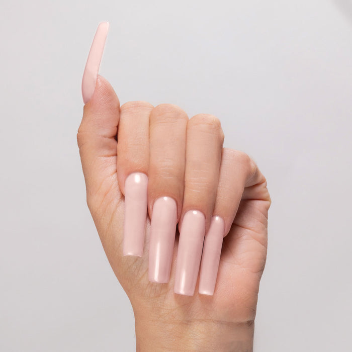 Just My Luck cover acrylic powder applied to light-skinned hand