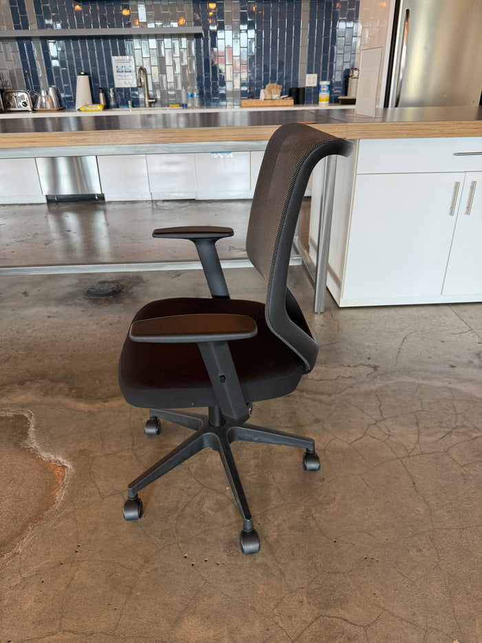 Black mesh chair adjustable arms and recline