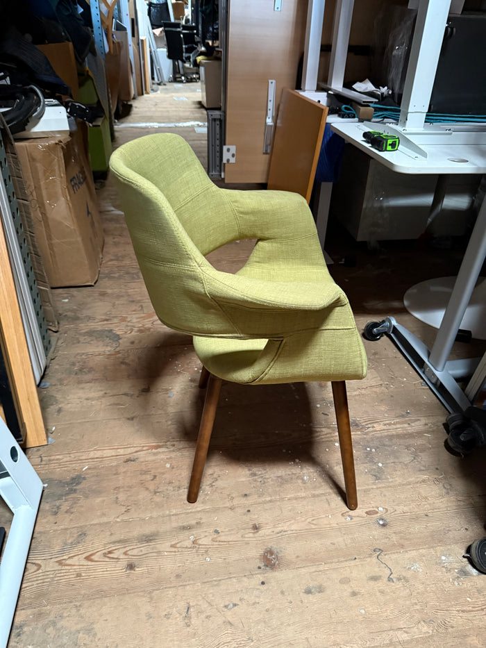 Green upholstered bucket chairs