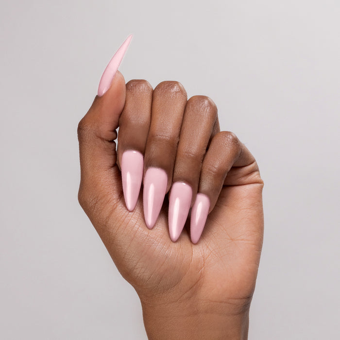 La La Love! cover acrylic powder applied to dark-skinned hand